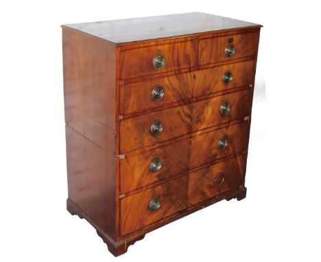 An early 19thC mahogany chest, of two short and four long drawers, with Hobbs and Co of London locks, with two split section,