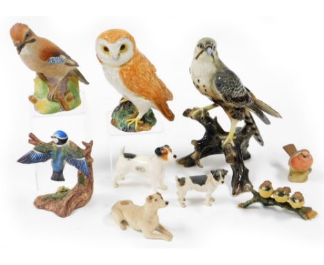 A group of various animal ornaments, to include a Capodimonte figure of three birds on a branch, an Aynsley robin, a Renaissa