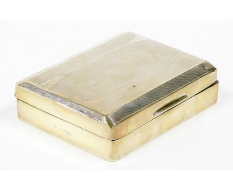 A George V silver cigarette box, with engine turned decorated top and a cedar interior, Birmingham 1931, 12cm x 9cm, 9¾oz gro