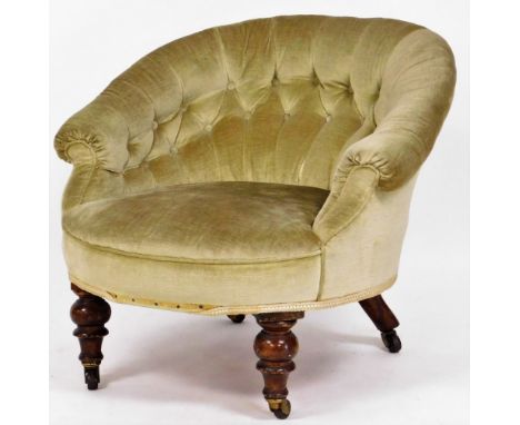 A Victorian walnut salon chair, green upholstery button back, 63cm high. 