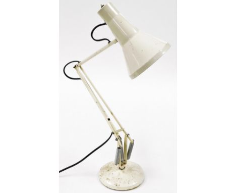 A cream angle poise lamp, 85cm high when fully extended.