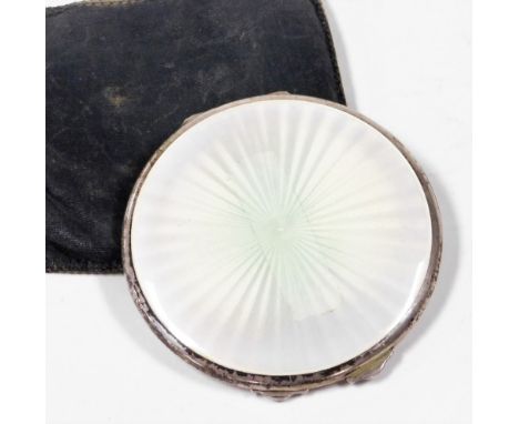 A silver and enamel compact, the top lid cream and green lustre enamel, opening to reveal powder compact and mirror, hallmark