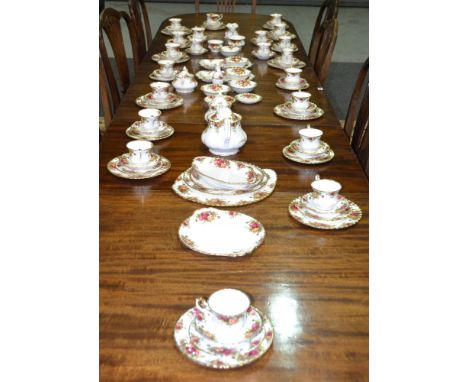 A large collection of Royal Albert Old Country Roses to include twenty teacups and saucers, various side plates, a teapot, ho