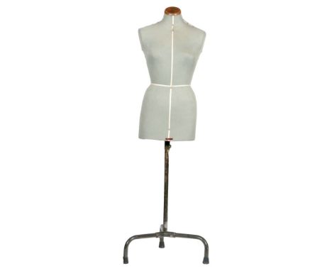 A vintage mannequin in green cloth, height 146cm