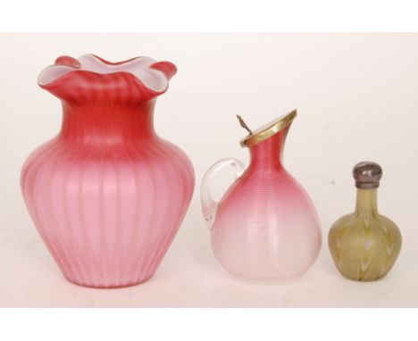 A late 19th Century John Walsh Walsh satin air trap vase of shouldered form below a narrow neck and folded rim with vertical 