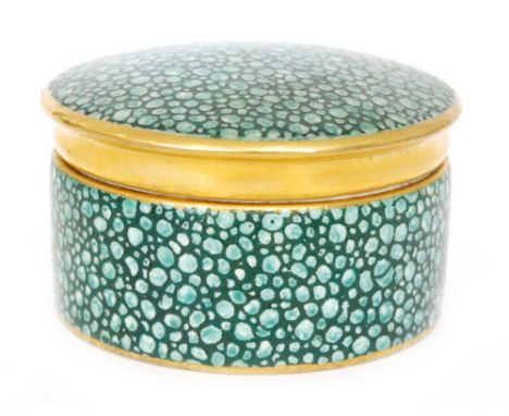 A 1930s Royal Worcester shape 2781 box and cover decorated in with an imitation shagreen with gilt banding, puce mark with da