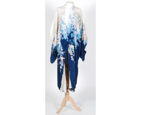 A 1950s lady's vintage kimono in a pink and blue floral print together with two 1930s bed jackets each with a Chinoiserie flo
