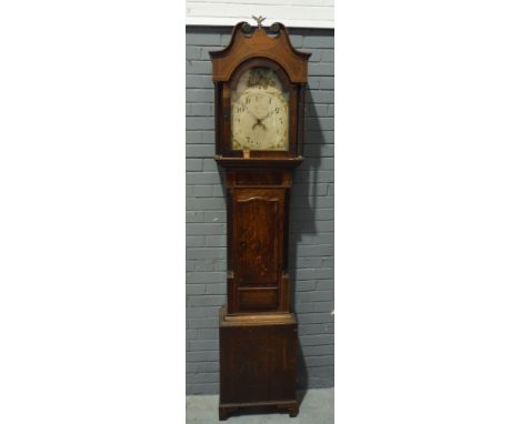 A 19th Century oak longcase clock with 30-hour movement, the 12 inch painted broken arch dial with floral spandrels and date 