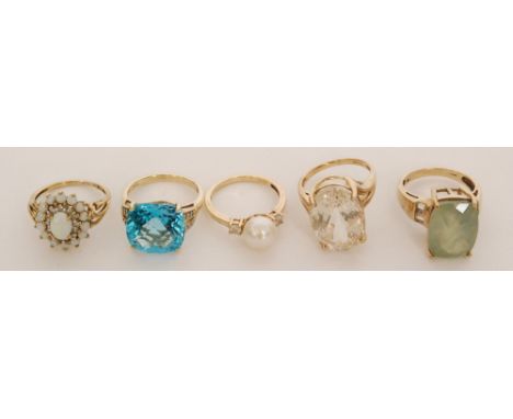 A group of  five 9ct stone set rings to include blue zircon, pearl, opal and quartz examples, stamped  (5)