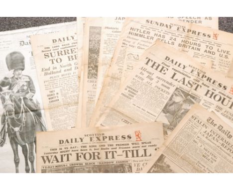 A collection of assorted vintage newspapers to include the Silver Jubilee Daily Mail 1935 printed on silver paper and various