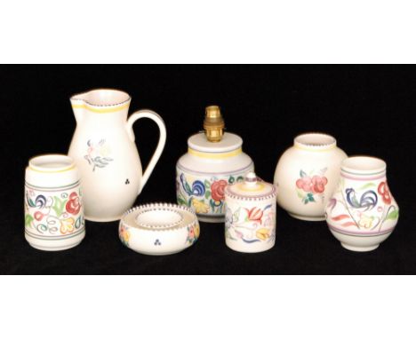 Seven pieces of assorted Poole Pottery to include a twin-tone hors d'oeuvre dish, a KW pattern jug, a WV base, an LE vase and