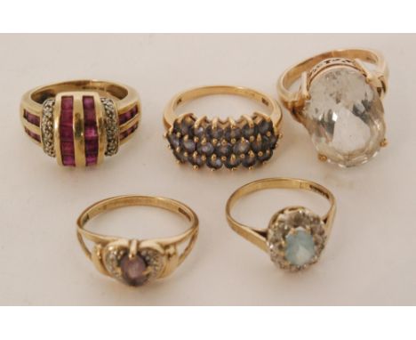 Five 9ct stone set rings to include a ruby cluster ring, tanzanite quartz, etc stamped (5)