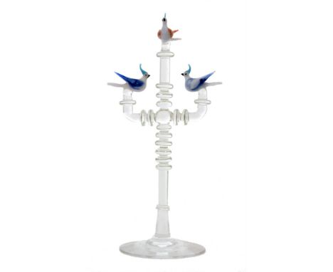 A 1940s William (Bill) Swingewood glass Birds of Paradise figure the clear crystal stand with a conical foot rising to the mu