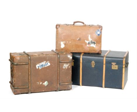An early 20th Century wooden bound brown canvas cabin steamer trunk, with leather trim, bearing remnants of Anchor Line, GWR 