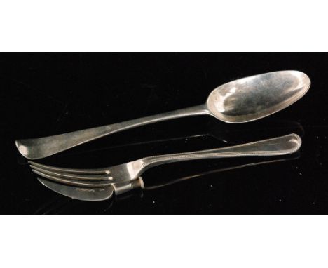 A Victorian hallmarked silver knife and fork combination with beaded border, with an old English pattern table spoon London 1