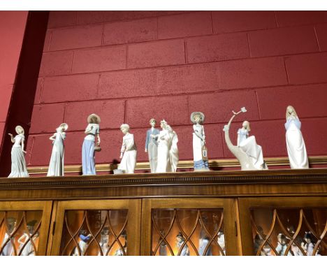Eight large Nao figures