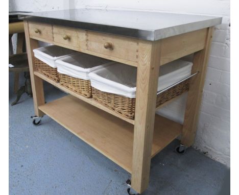 EDDINGTONS KITCHEN TROLLEY, beech with a rectangular metal top over three short drawers, a slatted shelf enclosing three loos