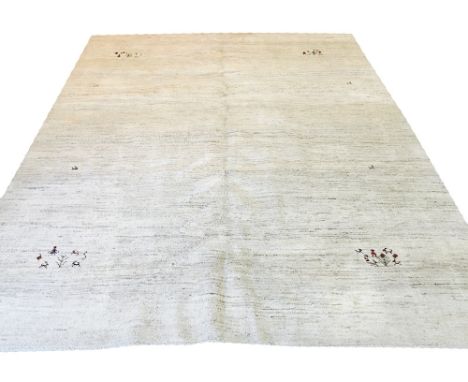 PERSIAN GABBEH CARPET, 344cm x 277cm, abrashed ivory field with scattered stylised figures and trees.