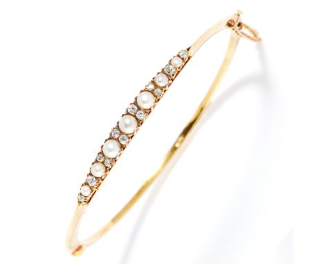 PEARL AND DIAMOND BANGLE in 15ct yellow gold, set with alternating round cut diamonds and pearls, stamped 15CT, 6cm inner dia