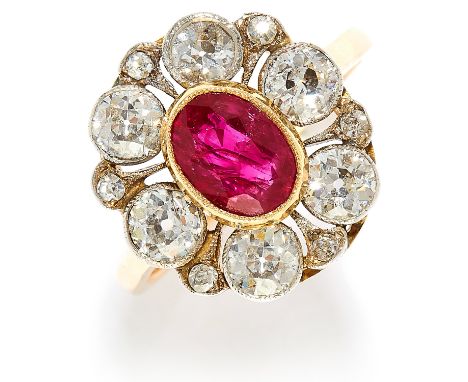 1.40 CARAT BURMA NO HEAT RUBY AND DIAMOND CLUSTER RING in high carat yellow gold, comprising of a Burma no heat ruby of 1.40 
