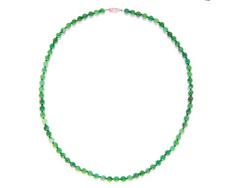 JADE AND DIAMOND BEAD NECKLACE in white gold or platinum, comprising of a single row of jade beads, the clasp set with round 