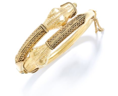 ANTIQUE GOLD SNAKE / DRAGON BANGLE in high carat yellow gold, depicting two dragon heads coiling around each other, marked in