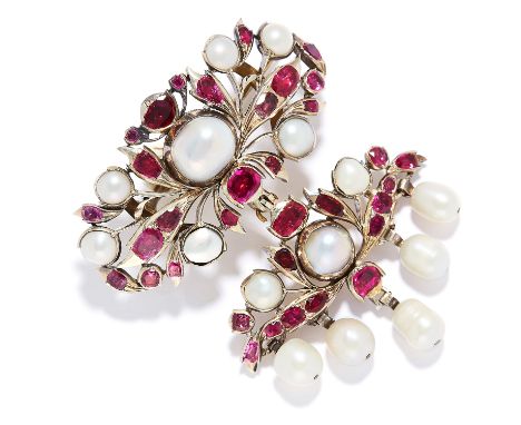 RUBY AND PEARL BROOCH in gold or silver, the openwork design is set with cushion cut rubies and pearls, unmarked, 5.4cm, 21.7