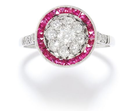 ART DECO DIAMOND AND RUBY RING in platinum or white gold, the central floral cluster set with old cut diamonds, encircled by 