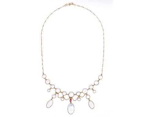 MOONSTONE AND RUBY NECKLACE in yellow gold, comprising of cabochon moonstone and an oval cut ruby, unmarked, 8.4g.