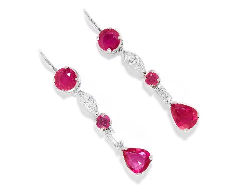 RUBY AND DIAMOND EARRINGS in 18ct white gold or platinum, each set with alternating round and pear cut rubies totalling appro