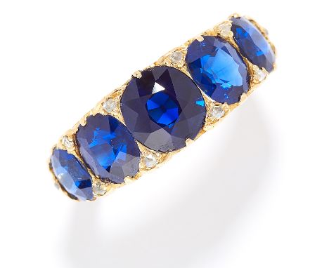 ANTIQUE BURMA NO HEAT SAPPHIRE AND DIAMOND RING, LATE 19TH CENTURY in high carat yellow gold, set with five graduated cushion