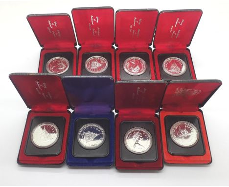 Eight cased 1976 Canadian silver proof dollars. P&amp;P Group 1 (£14+VAT for the first lot and £1+VAT for subsequent lots) 