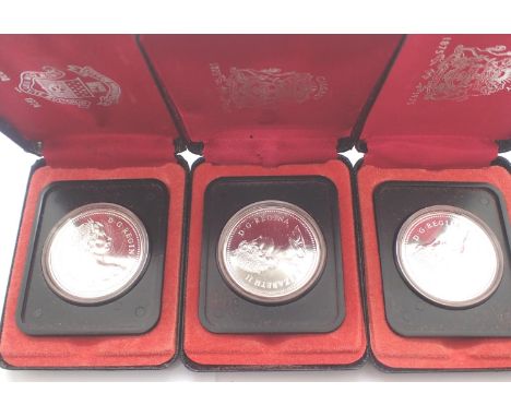 Three cased 1976 Canadian silver proof dollars. P&amp;P Group 1 (£14+VAT for the first lot and £1+VAT for subsequent lots) 