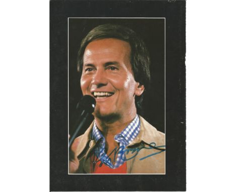 Pat Boone signed 12x8 programme page colour photo. American singer, composer, actor, writer, television personality, motivati