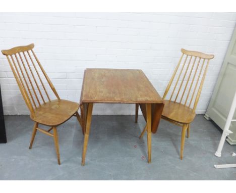 Ercol blonde elm dining set comprising a pair of chairs and a table, (3) 