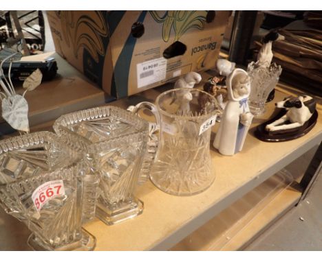 Shelf of mixed ceramics and glass 