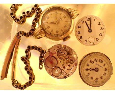 Collection of vintage wristwatch movements including a rolled gold example