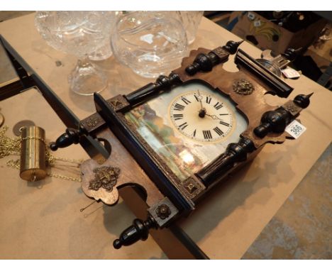 Antique style and oak cased wall clock with pendulum and weights