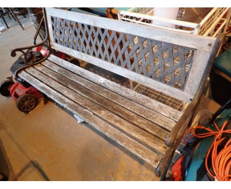 Garden bench with metal lattice back panel 