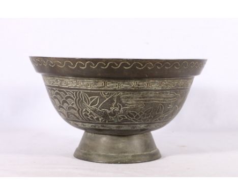 Chinese bronze bowl the exterior with incised decoration of birds and flowers within a key fret border, mark to base, 26cm. 