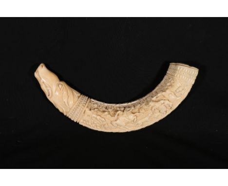 19th Century French finely carved ivory drinking horn or mull deeply carved with a bear hunting scene the reverse carved with