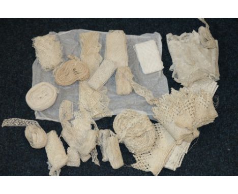 Large bag of cream and white bobbin, knitted, embroidered and other fine lace borders, some long lengths 