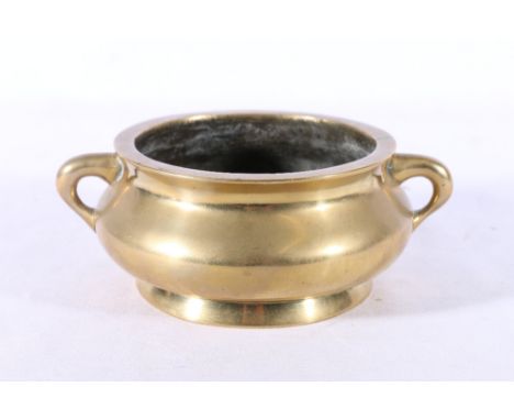 Chinese late 19th Century gilt bronze censer with loop handles, Xuande mark to the base, 17cm, 964g.Condition Report:Slightly