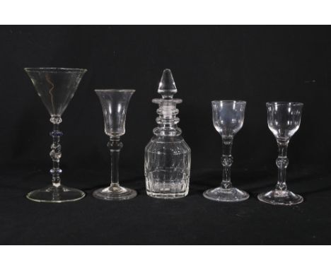 Near pair of Georgian glass balustroid drinking glasses with ball knop stems having voided tear drop interior raised on folde