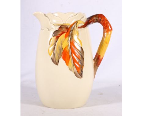 Clarice Cliff Newport Pottery pitcher or ewer jug with rustic handle and leaf pattern, numbered 817 to base, 24cm tall 
