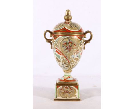 Noritake of Japan gilded porcelain twin-handled urn and cover, 28cm tall Rubbing throughout, particularly to the gilding. Pos