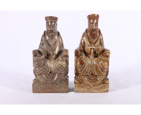 Pair of late 19th Century or early 20th Century Chinese soapstone carving of Buddhist figures seated on thrones, stylised cal