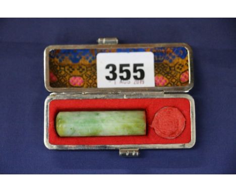 A mottled green jade seal or chop, cased, 4.5cm 