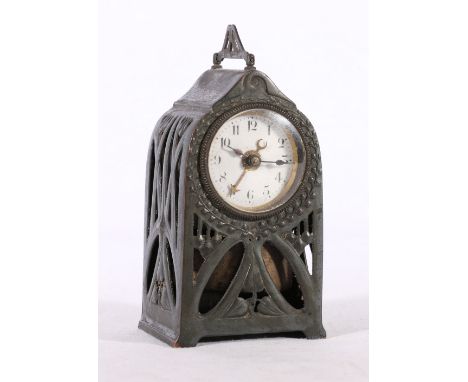 German Art Nouveau pierced white metal clock, 11cm tall  Doesn't appear to be working, when wound it doesn't appear to be cat