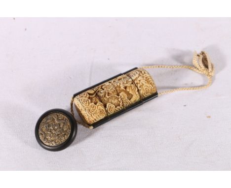 Japaneset ivory and lacquered wood four case inro with wood and gilt metal manju netsuke, the inro carved with a dragon among